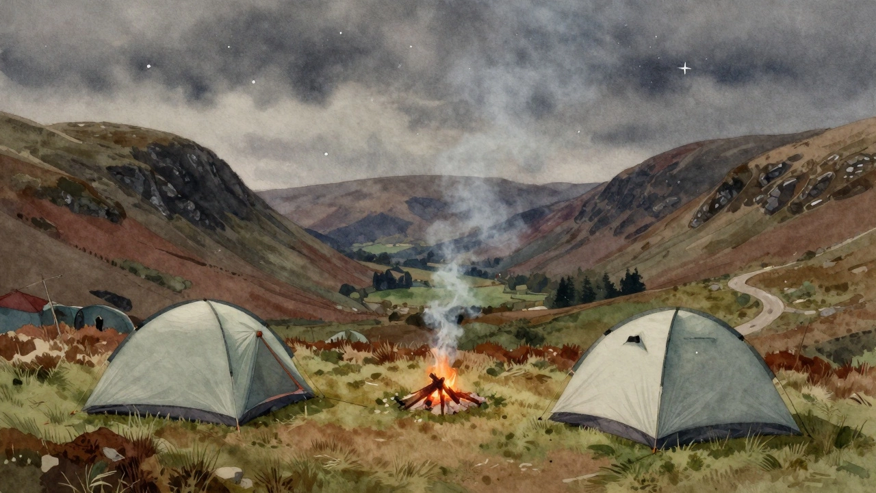 Two tents on high ground in the Lake District, with a distant footpath and embers of a small campfire.